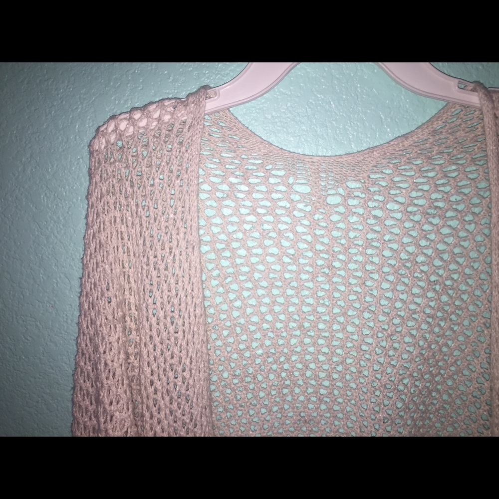 off-white, open-knit cardigan
